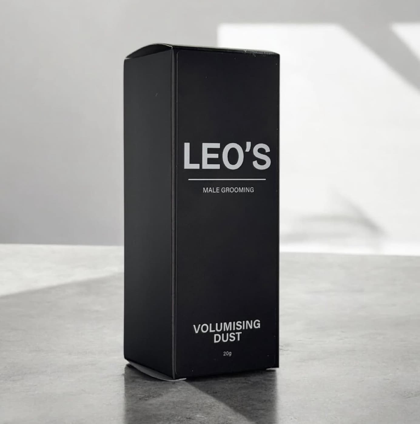 LEO'S Volumising Dust in its matte black carton